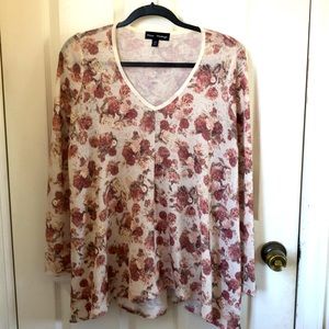 Floral print long sleeve tunic length blouse. Flowy and light-weight material.